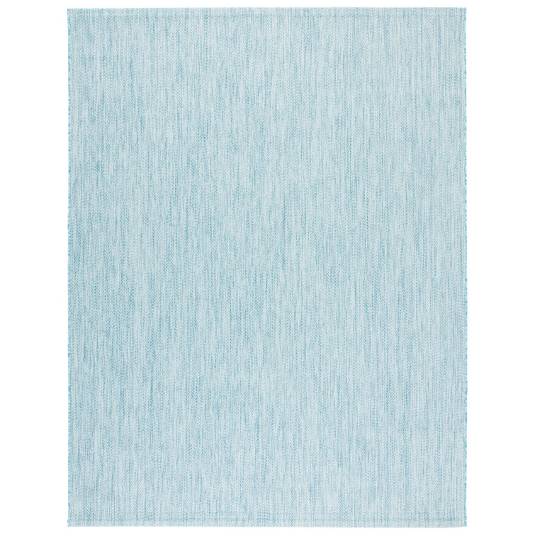 Tapis d'intérieur / extérieur de couleur unie Sayeda Performance