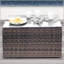 Table basse entièrement assemblée avec plateau rectangulaire en verre avec base en osier et en rotin, parfaite pour un décor moderne et naturel.