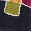 Coussin décoratif bleu marine à motifs tribaux brodés