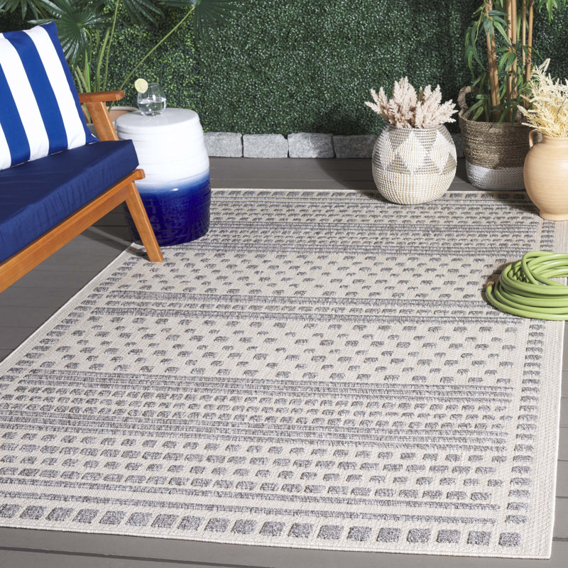 Gray and Beige Geometric 8' x 10' Synthetic Area Rug