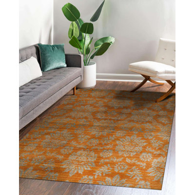 Ruby Inviting Brown Machine Made Wool Transitional Floral Area Rug