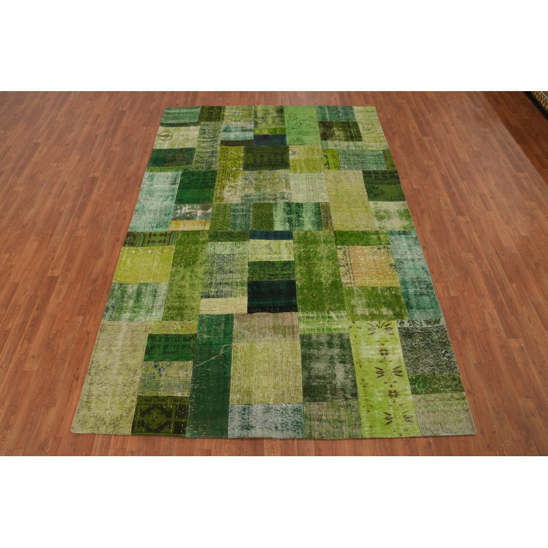 Tapis vert en laine patiné 7 x 10