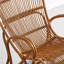 Chaise berçante en rotin brillant