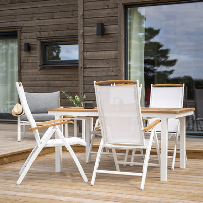 Navya 4 - Person Teak Patio Dining Set with Extendable Rectangular Table