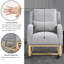 Fauteuil à bascule décontracté de couleur grise avec coussin lombaire extra confortable