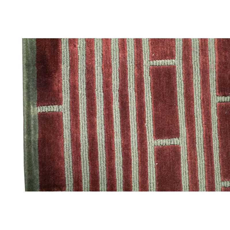 Tapis vert et vin de haute qualité noué à la main