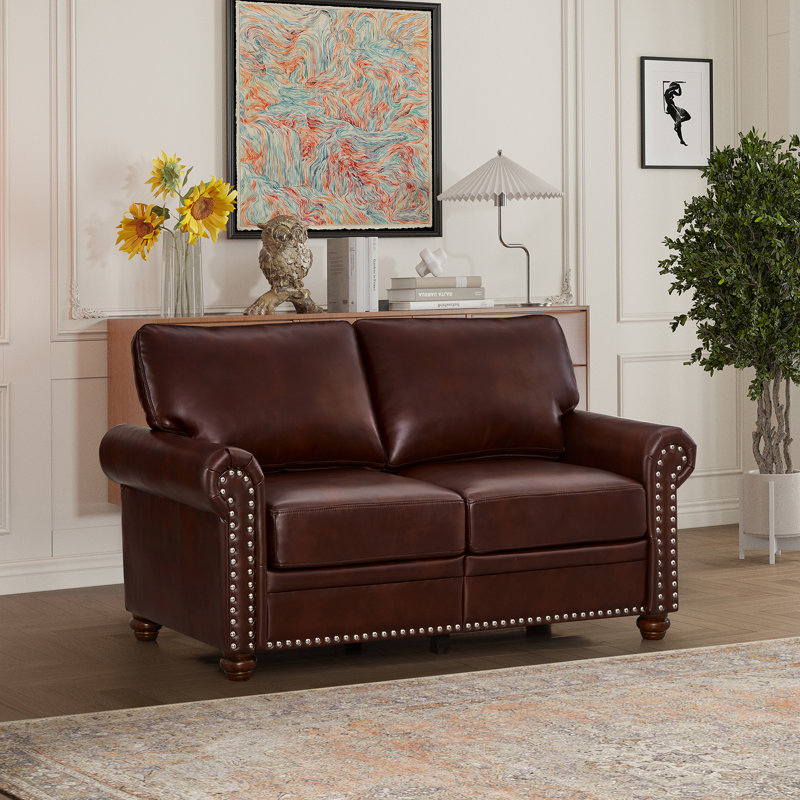 Charmant fauteuil en similicuir avec rangement et sièges confortables