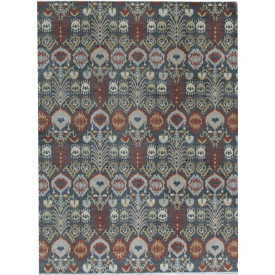 Tapis bleu clair et doré de haute qualité noué à la main