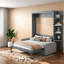 Lit escamotable gris avec canapé, peu encombrant, de conception moderne, pour une utilisation multifonctionnelle