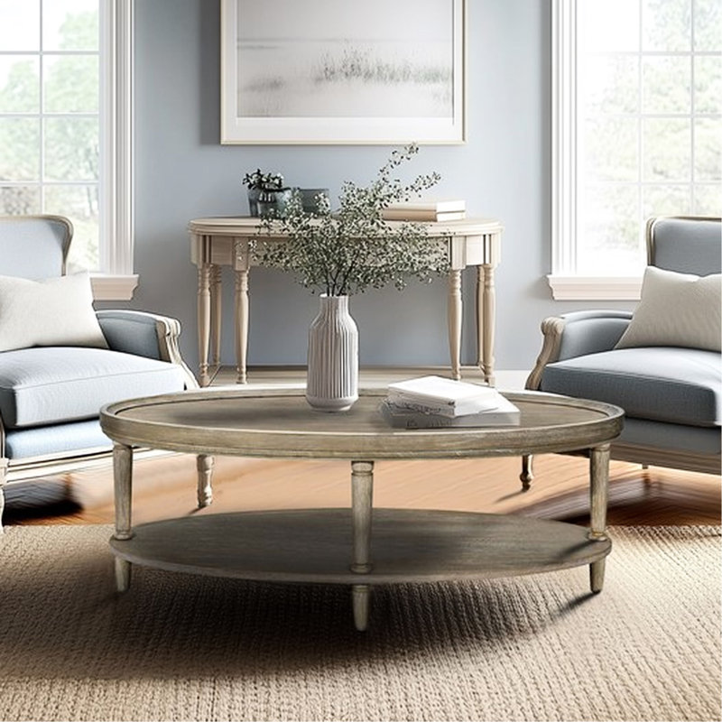 Table basse ovale avec tablette de rangement, atmosphère classique, pieds élégants, finition grège, niveleurs réglables pour une stabilité stable, pieds, étagères fixes