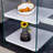 Three-tier bedside table: mdf top with white stickers, transparent tempered glass sides, simple design with storage (112 characters)