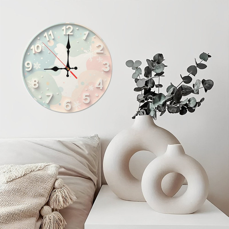 Horloge pastel avec des flocons de neige