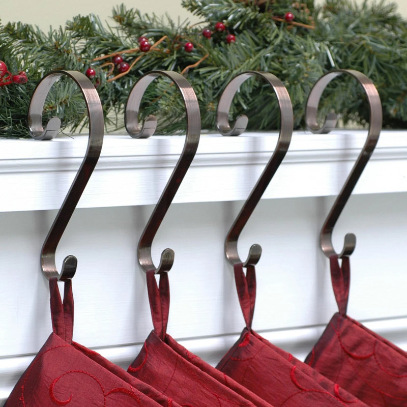 Porte-bas de Noël à volutes, Bronze frotté à l'huile