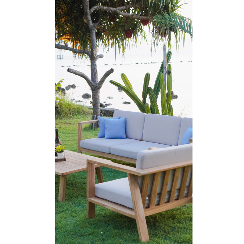 Canapé d'extérieur pour terrasse avec coussins blancs, structure en teck