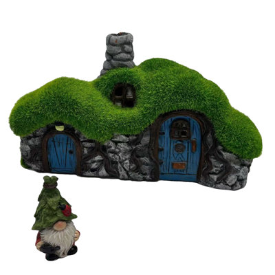 Maison de gnome avec statue de gnome
