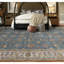 Tapis bleu et doré de haute qualité noué à la main
