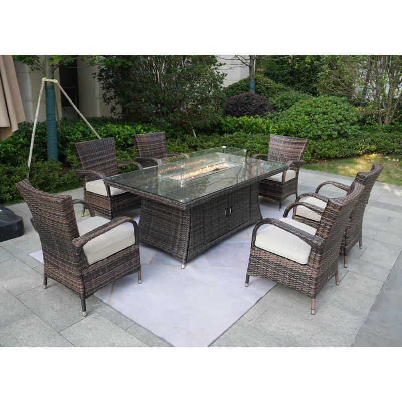 Ardala 6 - Person Wicker Patio Dining Set with Rectangular Table , Cushions Included, Brown