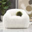 Fauteuil pivotant contemporain en fausse fourrure blanche à 360° avec coussin, doux et luxueux, idéal pour le salon ou la pièce principale.