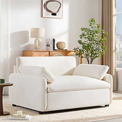 Chaise rembourrée avec accoudoirs et coussins