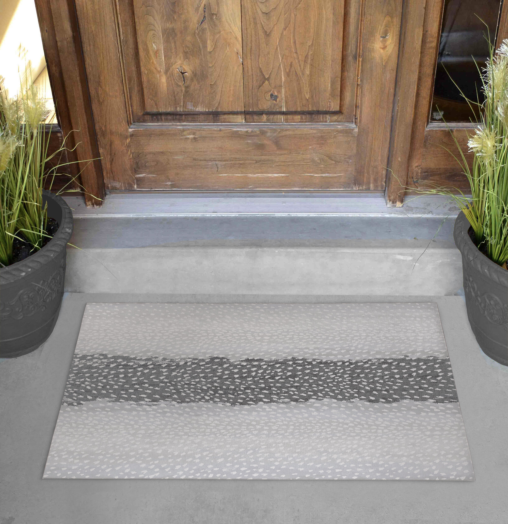 https://assets.wfcdn.com/im/13239671/compr-r85/1535/153591885/fawn-non-slip-animal-print-outdoor-doormat.jpg