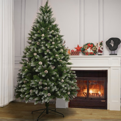 White Sprayed Christmas Tree With Pinecones