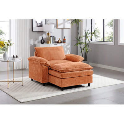 Fauteuil surdimensionné confortable avec repose-pieds, idéal pour se détendre avec style dans n'importe quelle pièce