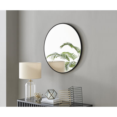 Alcantera Round Metal Frame Wall Mirror Simple and Elegant Modern Design