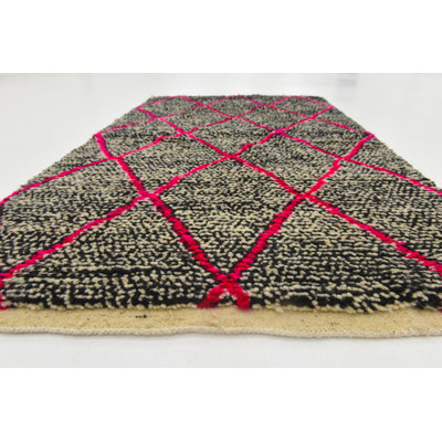 Tapis noir Kalmanovitz