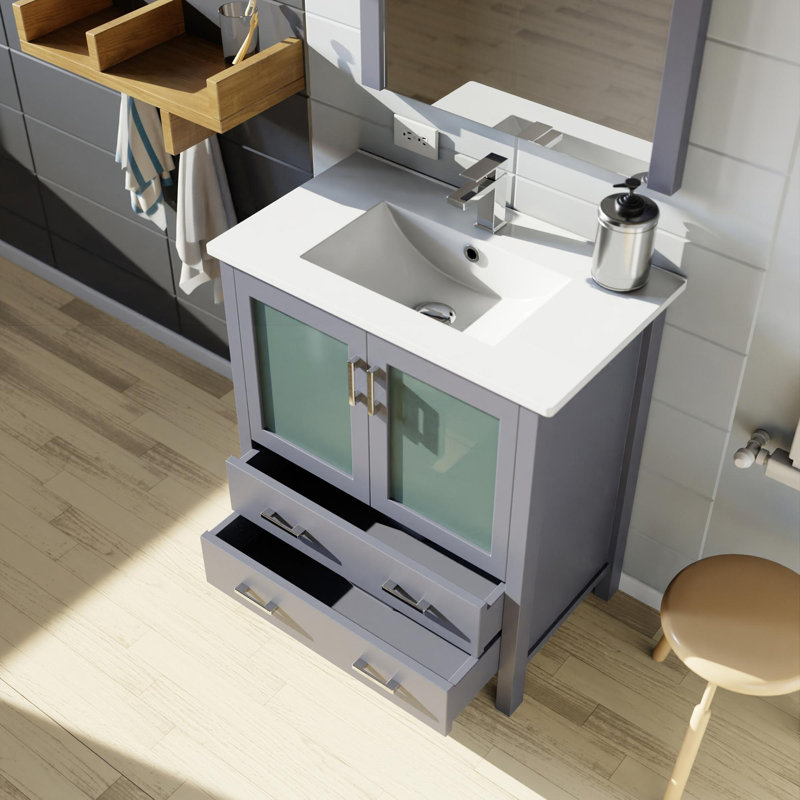 Ensemble de meuble-lavabo avec comptoir en céramique blanche et robinet
