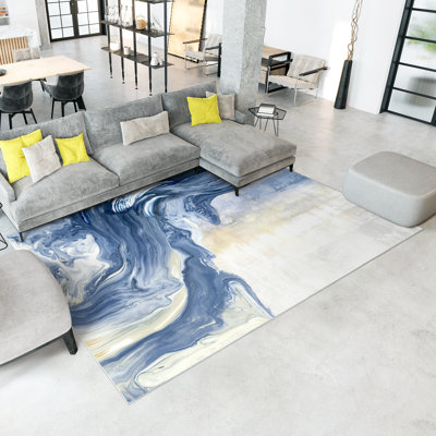 Tapis rectangulaire Divyan avec envers antidérapant