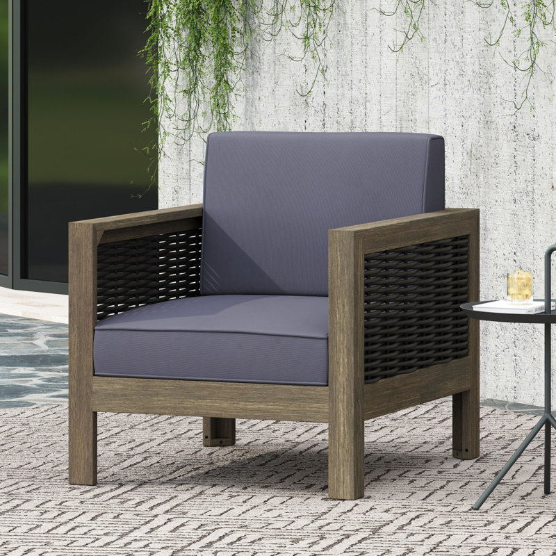 Fauteuil club d'extérieur en bois d'acacia avec accents en osier