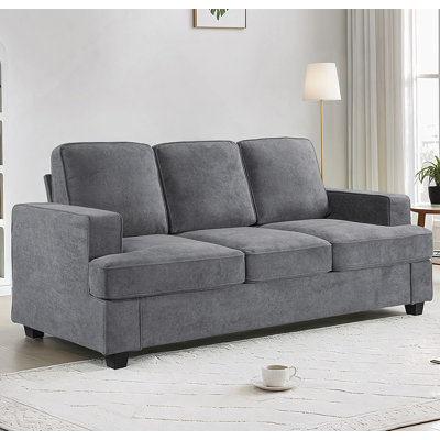 Canapé confortable en velours avec coussins moelleux pour la détente