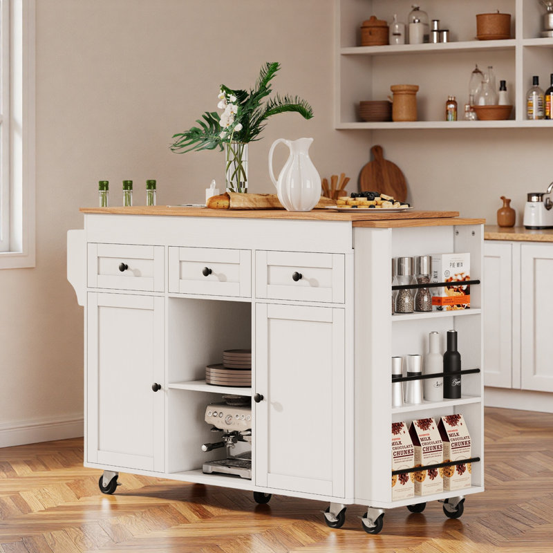 Îlot de cuisine roulant avec table de salle à manger extensible, station de charge, support de rangement ouvert à trois niveaux, 3 tiroirs et 2 armoires de rangement