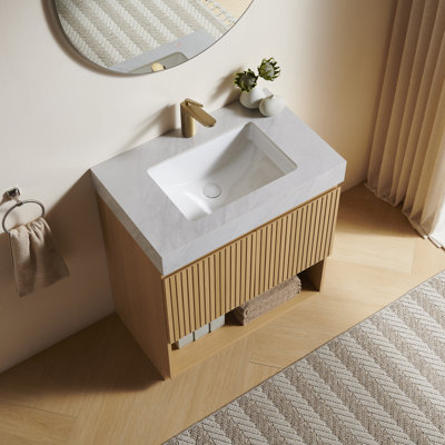 Meuble-lavabo FINO 30, sur pied, comptoir en pierre frittée gris Carrara veinée et lavabo en céramique avec 1 trou pré-percé pour robinetterie, démonté, robinetterie et bonde non inclus, couleur chêne Corolla.