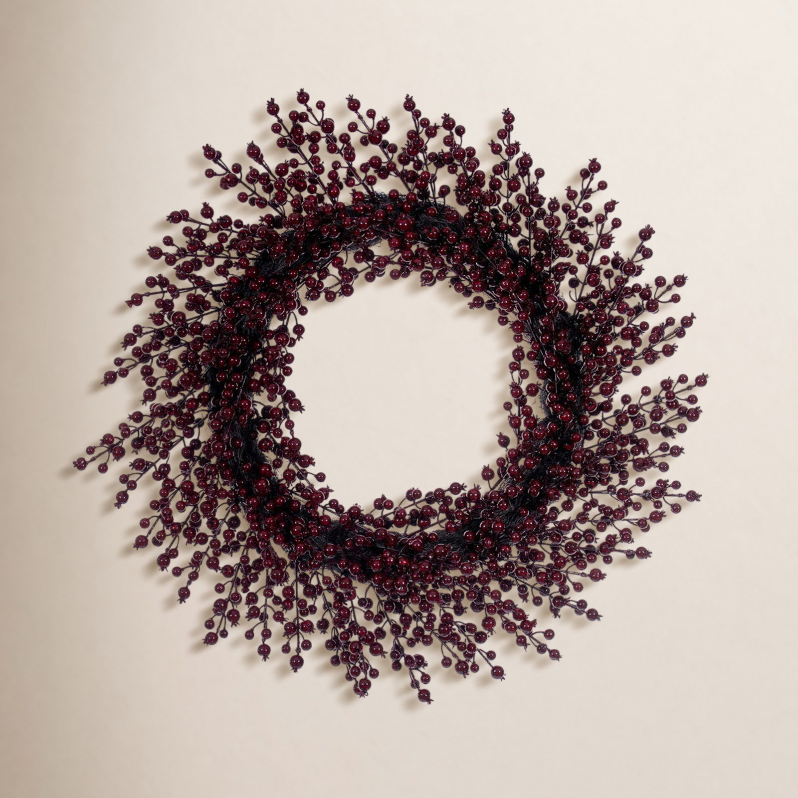 28" Burgundy Crab Apple Mixed Berry Wreath. This artificial wreath features vibrant burgundy berries and measures 28 inches wide. It is rated for indoor and outdoor use.