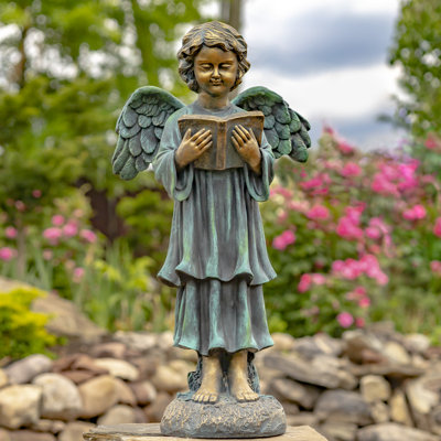 Statue de jardin enfant ange lisant un livre en magnésium