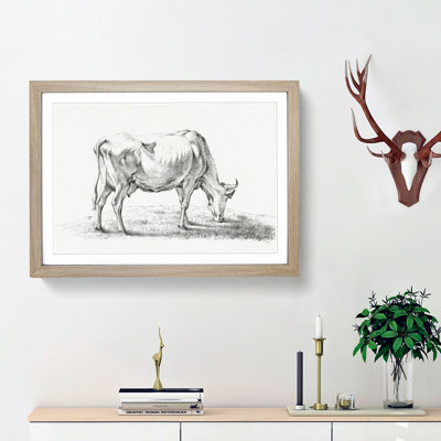 A Grazing Cow by Jean Bernard - Framed Print