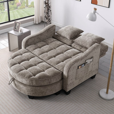 Double sofa chaise longue with irregular armrests and two small throw pillows