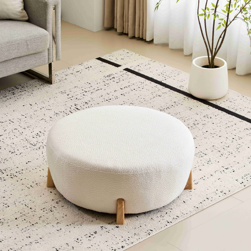 Repose-pieds Modish: Boucletop avec pieds évasés en bois d'hévéa, Blanc