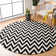 Rodgers Hand Woven Flat Weave Wool/Cotton Chevron Rug in Ivory/Black