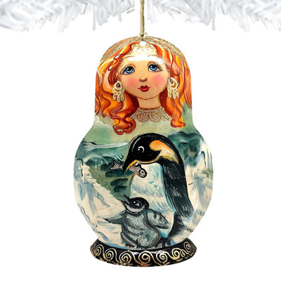 Ornement en bois pingouin Matreshka par G. DeBrekht