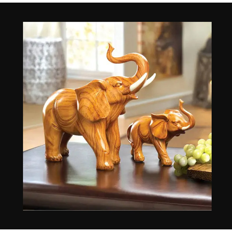 Set of Three Light Brown Wooden Elephant Figurines
