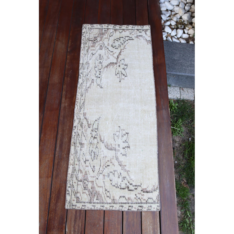 Tapis turc beige en laine tissé à la main avec pompons, idéal pour le vestibule