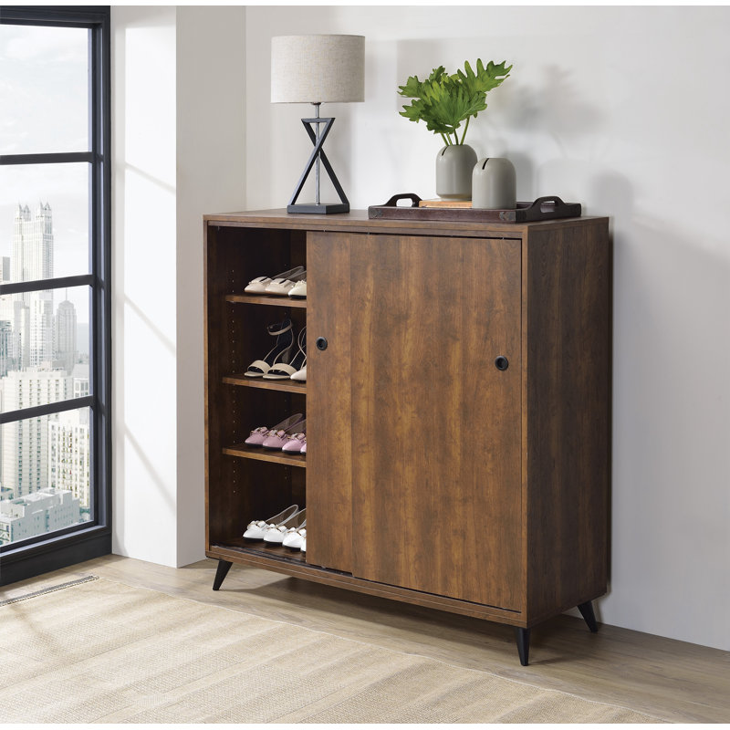 armoire à chaussures avec portes coulissantes et tablettes réglables