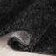 Tapis noir à poils longs Berte-64594339
