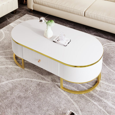 Table basse moderne ovale avec tiroirs, conception à profil incurvé, décor en métal doré, table centrale pour le salon
