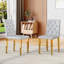 Chaises de salle à manger en polyuréthane avec dossier à boucle ergonomique et pieds en métal argenté, combinant confort et style pour divers environnements.-1582843153-1582843151-1582843145