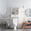 Armoire de rangement au-dessus de la toilette blanche avec un tiroir et 2 tablettes