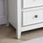 Commode à 5 tiroirs beige avec rangement pratique et élégant pour éviter les collisions