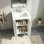 Meuble-lavabo moderne 24 po avec motif elliptique orné et charnières à fermeture douce